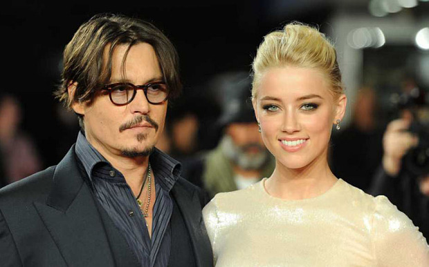Johnny Depp’s wife Amber Heard to plead not guilty to smuggling pet dogs into Australia
